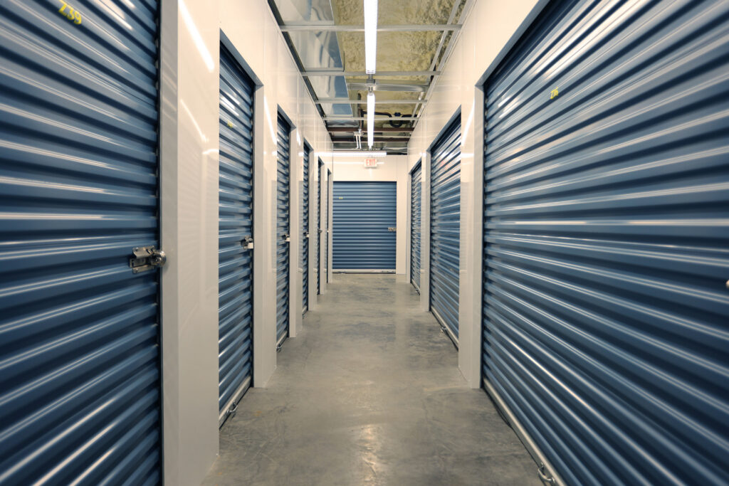 Interior storage units at Discount Storage in O’Fallon, IL, featuring clean hallways and secure spaces for personal and household storage.